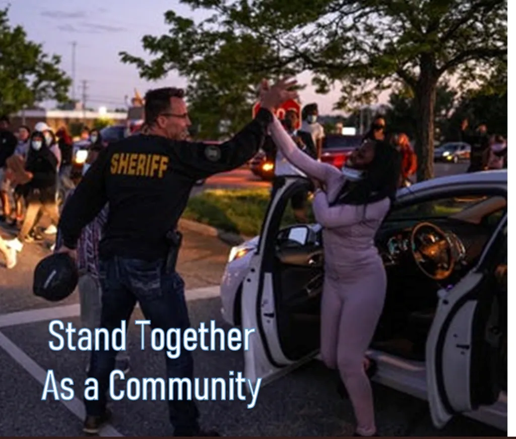 A sheriff and a woman doing a hi-five and a few other individuals in the background