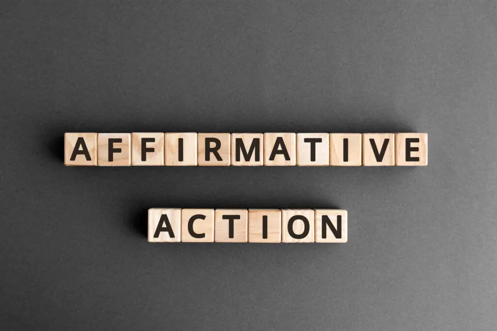 Two words “Affirmative Action” written with Scrabble pieces