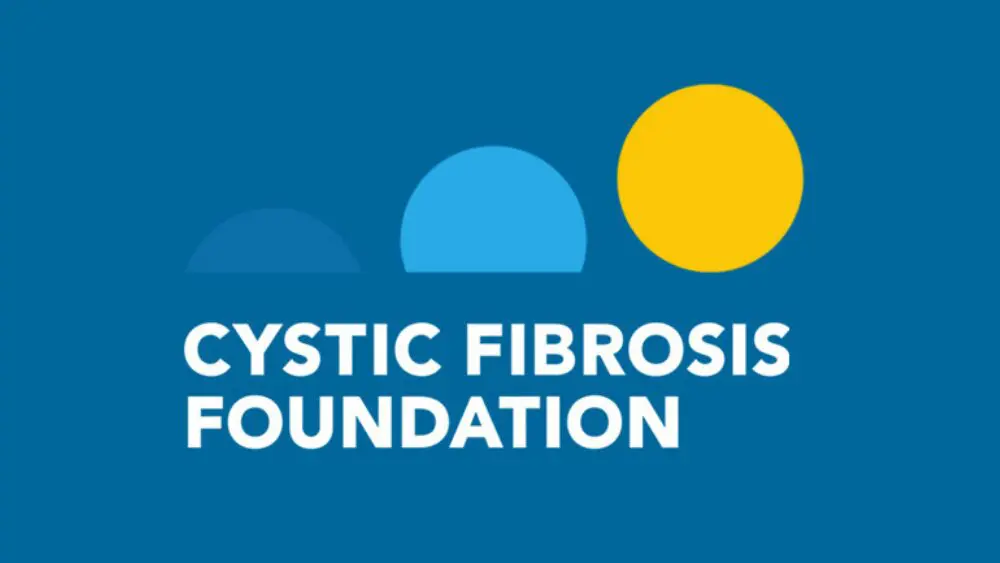 Cystic fibrosis foundation logo with a stylized sun and waves on a blue background.