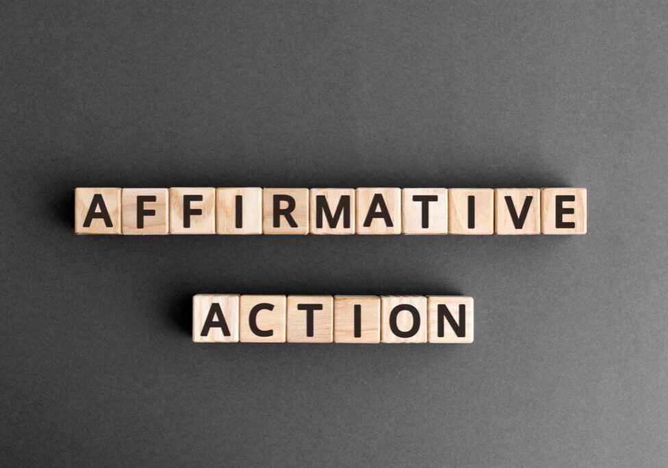 Two words “Affirmative Action” written with Scrabble pieces