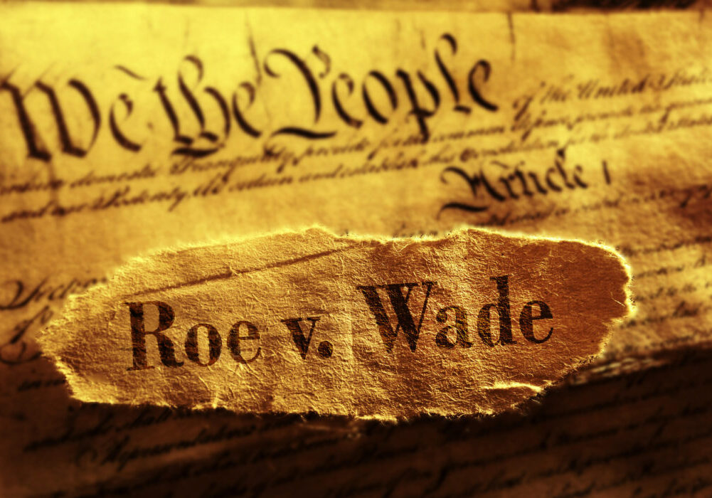The words “Roe v. Wade” printed on paper
