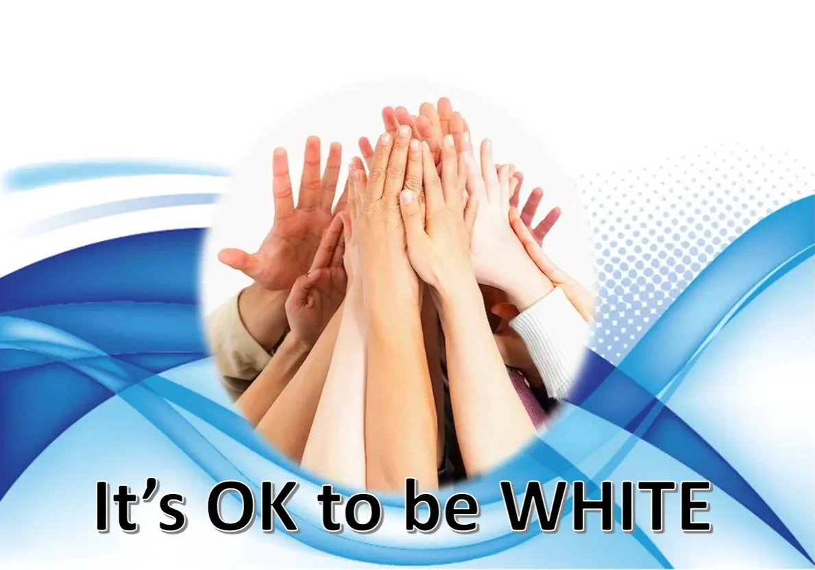 A number of human hands facing upward with the words “It’s OK to be WHITE”