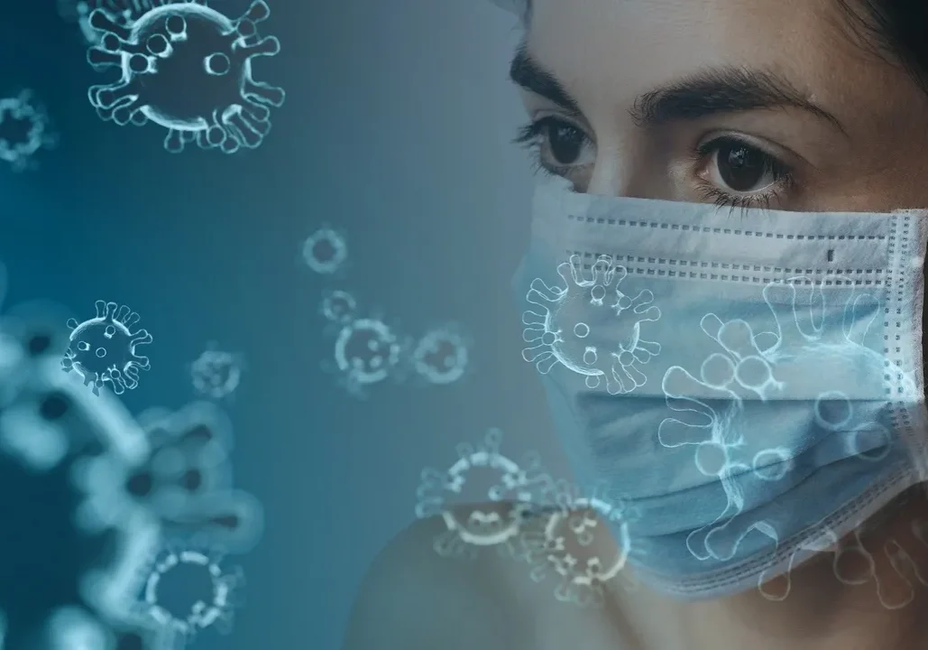 A woman wearing a mask and looking at virus cells