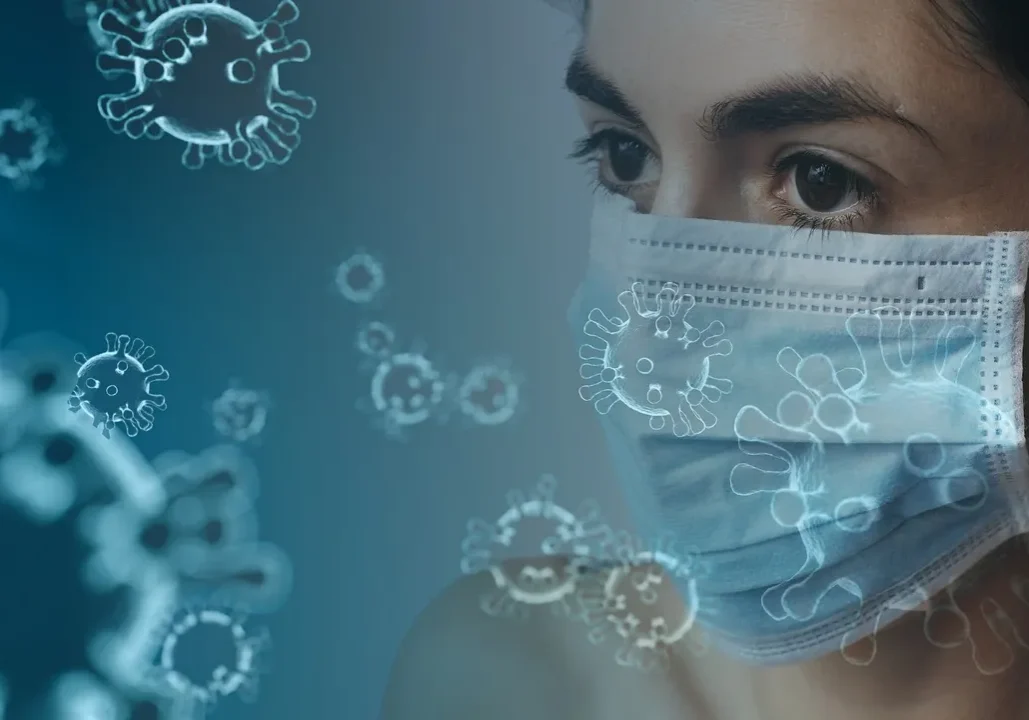 A woman wearing a blue mask with virus cells floating in the air